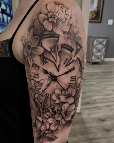 Broken clock and flowers tattoo
